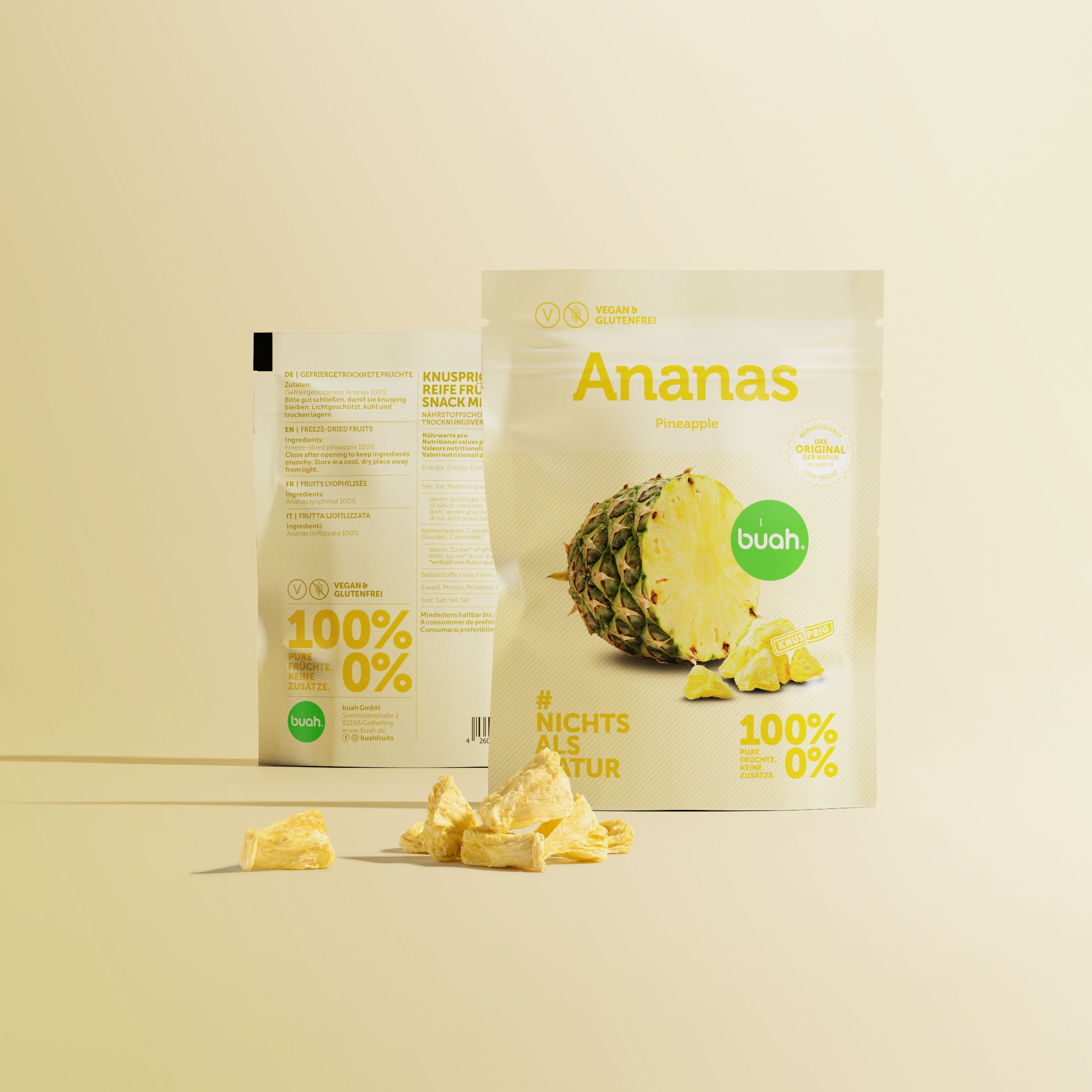 Zwei buah Ananas Snackpack nebeneinander mit Vorder- und Rueckansicht der Packung
